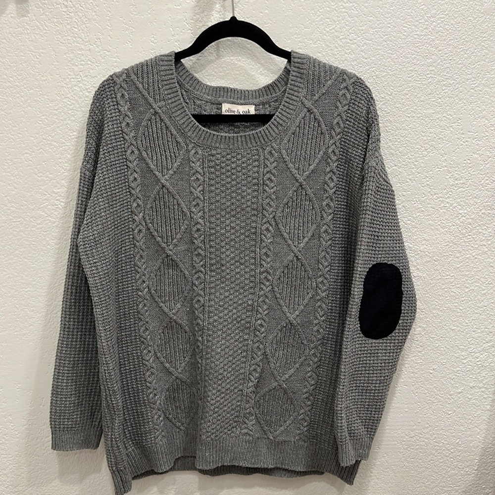 Oversized cable knit sweater with elbow patches